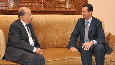 الرئيسان عون والأسد (أرشيفية).