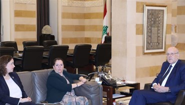 رئيس حكومة تصريف الأعمال نجيب ميقاتي والأمينة العامّة خالدة بوزار. 