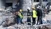  رجال الإطفاء يبحثون عن الضحايا والناجين تحت أنقاض مبنى انهار إثر انفجار صهريج غاز في مدينة السليمانية شمال العراق في 18 تشرين الثاني (أ ف ب). 