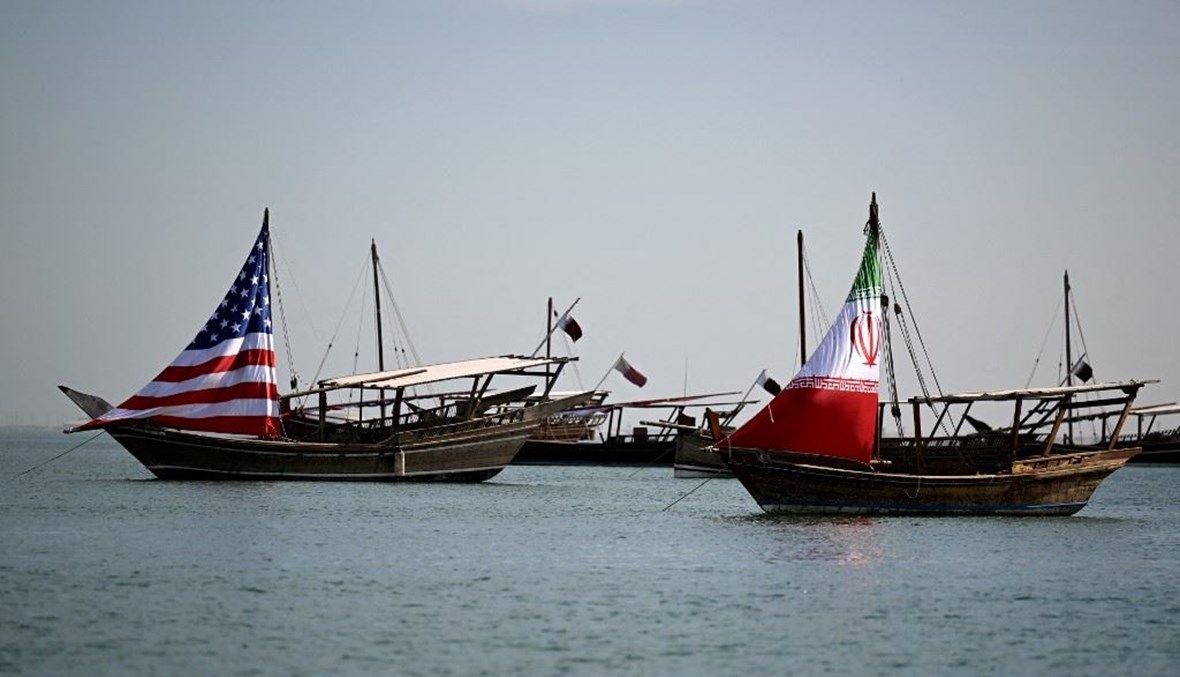 سفينتان ترفعان العلمَين الإيراني والأميركي في المياه القطرية قبيل لقاء المنتخبين في كأس العالم (تعبيرية- "أ ف ب").