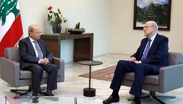 رئيس الجمهورية السابق ميشال عون ورئيس حكومة تصريف الأعمال نجيب ميقاتي - أرشيفية.