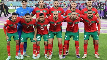 منتخب المغرب قُبيل بدء الماراة مع البرتغال (أ ف ب).