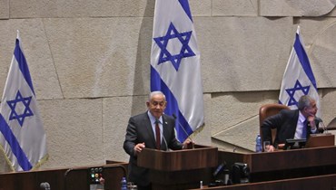 نتنياهو متكلما في الكنيست في القدس خلال جلسة لانتخاب رئيس جديد للبرلمان (13 ك1 2022، أ ف ب).