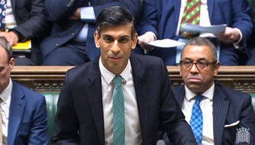 سوناك مخاطبا أعضاء البرلمان بشأن الهجرة غير الشرعية، في مجلس العموم بلندن (13 ك1 2022، أ ف ب). 