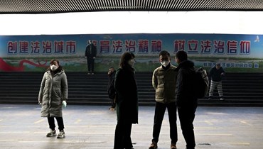 ركاب في محطة قطارات في بنجبو بمقاطعة آنهوي شرق الصين (5 ك2 2023، أ ف ب). 