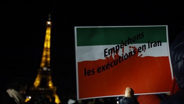 تظاهرة مندّدة بالسياسات الإيرنية في باريس (أ ف ب).