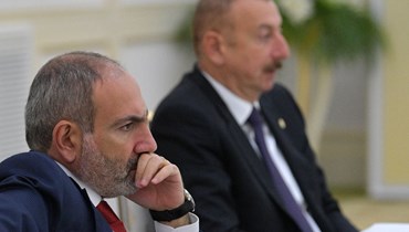 رئيس وزراء أرمينيا نيكول باشينيان ورئيس أذربيجان إلهام علييف (رويترز).