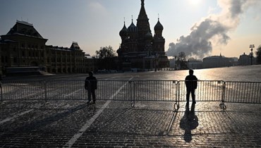 عناصر من الحرس الوطني الروسي تأهبوا في الساحة الحمراء وسط موسكو قبل خطاب لبوتين (21 شباط 2023، أ ف ب). 