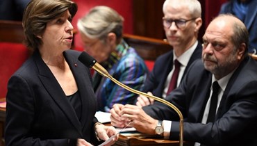 كولونا تحضر جلسة مساءلة للحكومة في الجمعية الوطنية في باريس (28 شباط 2023، أ ف ب). 