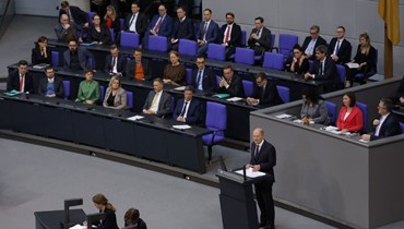  شولتس يخاطب أعضاء البرلمان في مقر البوندستاغ ببرلين (2 آذار 2023، أ ف ب). 