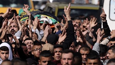 تشييع ثلاثة فلسطينيين في جبع بالضفة الغربية المحتلة، بعد مقتلهم برصاص القوات الإسرائيلية (9 آذار 2023، ا ف ب).