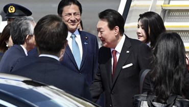 وصول الرئيس الكوري الجنوبي إلى اليابان (أ ف ب). 