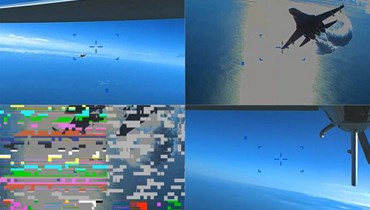 صور من مقطع فيديو نشره موقع الجيش الأميركي في أوروبا بتاريخ 16 آذار 2023 يُظهر لقطات صوّرتها طائرة MQ-9 الأميركية خلال الحادثة فوق البحر الأسود في 14 آذار 2023 (16 آذار 2023 - أ ف ب).