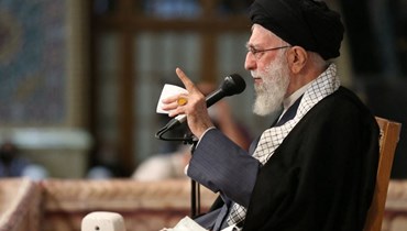 خامنئي متكلما خلال تجمع في مدينة مشهد (21 آذار 2023ـ أ ف ب). 