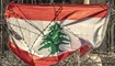 علم لبنان خلف سياج شائك. (أرشيفية. نبيل اسماعيل)