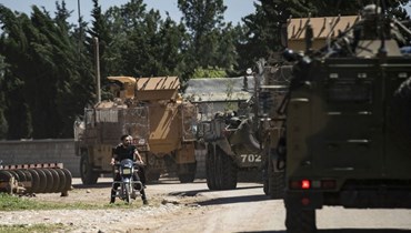  عربات عسكرية تركية وروسية تقوم بدوريات في محافظة الحسكة شمال شرق سوريا (أ ف ب). 
