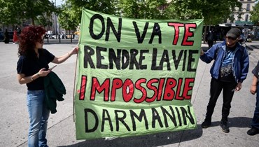 متظاهرون أثناء مشاركتهم في تحرّك ضد الاقتراح التشريعي لوزير الداخلية الفرنسي بشأن اللجوء والهجرة، في مرسيليا (أ ف ب). 