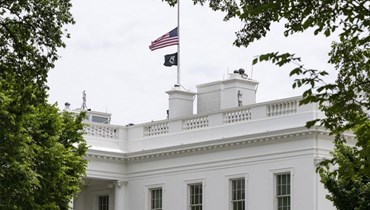 العلم الأميركي يرفرف  فوق البيت الأبيض في واشنطن العاصمة (أ ف ب). 