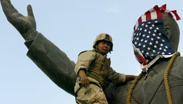 إسقاط تمثال صدام حسين في بغداد. (أرشيفية- "أسوشيتد برس").