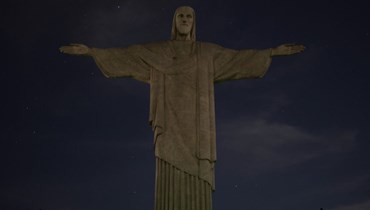 إطفاء أضواء تمثال المسيح في ريو تضامناً مع فينيسيوس (أ ف ب).