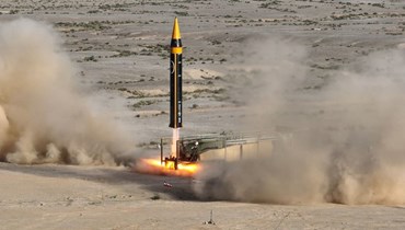 إيران تختبر صاروخاً باليستيّاً طويل المدى (أ ف ب).