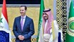 الرئيس السوري بشار الأسد مع نائب أمير مكة المكرمة بدر بن سلطان بن عبد العزيز عشية قمّة جدّة (أ ف ب).