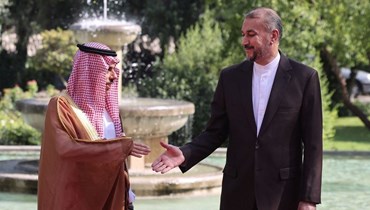 وزير الخارجية السعودي فيصل بن فرحان ونظيره الإيراني أمير عبد اللهيان (أ ف ب). 