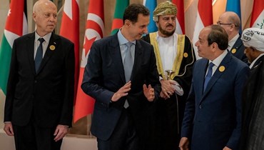 الأسد في القمة العربية (أ ف ب).
