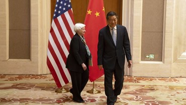  رئيس الوزراء الصيني هي ليفينغ ووزيرة الخزانة الأميركية جانيت يلين (أ ف ب).