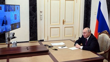 بوتين يترأس اجتماعا حول القضايا الاقتصادية، عبر الفيديو، في الكرملين بموسكو (25 تموز 2023، أ ف ب). 