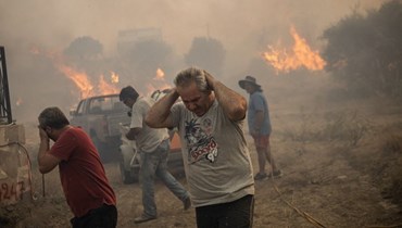 حرائق الغابات في اليونان (أ ف ب).