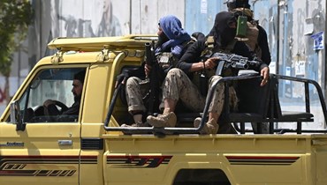عناصر "طالبان" خلال مسيرة في اليوم العاشر في كابول (أ ف ب). 