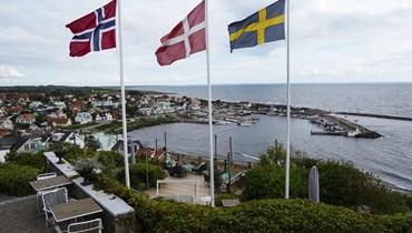 صورة ارشيفية- اعلام السويد والنروج والدانمارك رفعت في ميناء مولي جنوب غرب السويد (25 حزيران 2023، أ ب). 