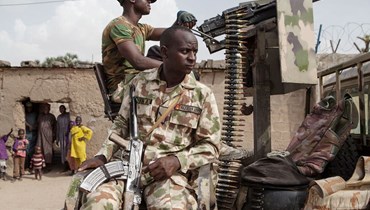 صورة ارشيفية- جنود نيجيريون يقومون بدورية في شمال شرق نيجيريا (أ ف ب). 