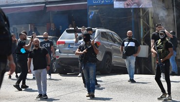 مسلحون خلال تشييع فادي بجاني في الكحالة (حسام شبارو).