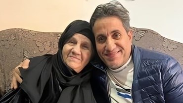 أحمد شيبة ووالدته الراحلة.