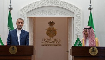 مؤتمر صحافي مشترك بين وزيرَي الخارجية السعودي والإيراني في الرياض (أ ف ب).