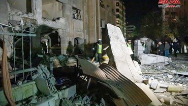 الدمار الذي لحق بحيّ سكني في كفرسوسة في دمشق جرّاء قصف إسرائيلي ("سانا"، أرشيفيّة). 