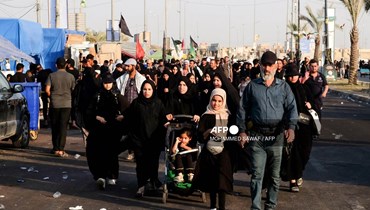 حجّاج يصلون إلى مدينة كربلاء وسط العراق لإحياء ذكرى "الأربعين" (أ ف ب). 