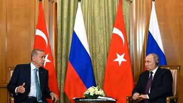 الرئيس التركي رجب طيب إردوغان ونظيره الروسي فلاديمير بوتين (أ ف ب).