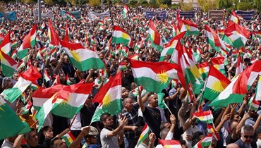 متظاهرون خلال تحرك حاشد في مدينة دهوك شمال العراق (5 ايلول 2023، أ ف ب). 