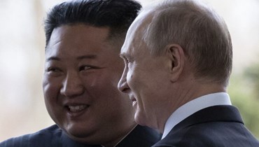 الرئيس الروسي فلاديمير بوتين والزعيم كيم جونغ-أون (أ ف ب). 