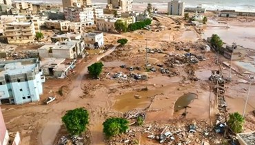 مهالم درنة الليبية تختفي بعد إعصار "دانيال" (أ ف ب).