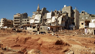 منازل متضررة في مدينة درنة شرق ليبيا من جراء العاصفة "دانيال" ( 15 ايلول 2023، ا ف ب).