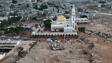 مسجد وسط الدمار الناجم عن السيول  ألتي اجتاحت " مدينة درنة بشرق ليبيا (أ ف ب). 