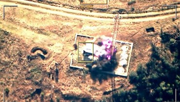 لقطة من فيديو نشرته وزارة الدفاع الأذربيجانية في 19 أيلول 2023، يظهر انفجارا في منطقة جبلية تدّعي باكو أنه "تدمير مواقع" يستخدمها الأرمن في منطقة ناغورنو- كراباخ (أ ف ب).