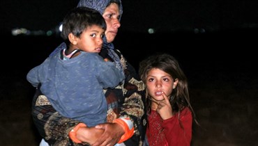 لاجئون سوريون (أ ف ب).
