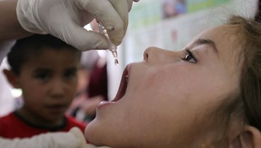التلقيح ضدّ شلل الأطفال.