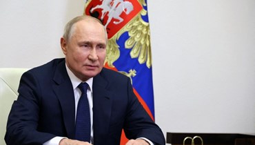 بوتين خلال القائه خطابا، عبر الفيديو، في مقر الإقامة نوفو-أوغاريوفو  خارج موسكو، في الذكرى الـ30 لإنشاء لجنة الانتخابات المركزية (24 ايلول 2023، أ ف ب).