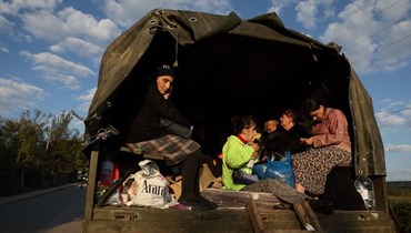 مهاجرون من مراباخ إلى أرمينيا (أ ف ب).